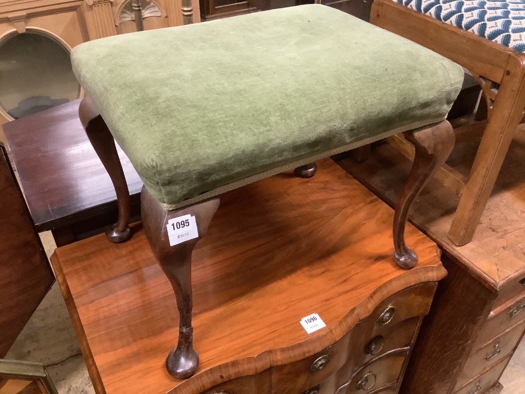 A mahogany stool with upholstered seat